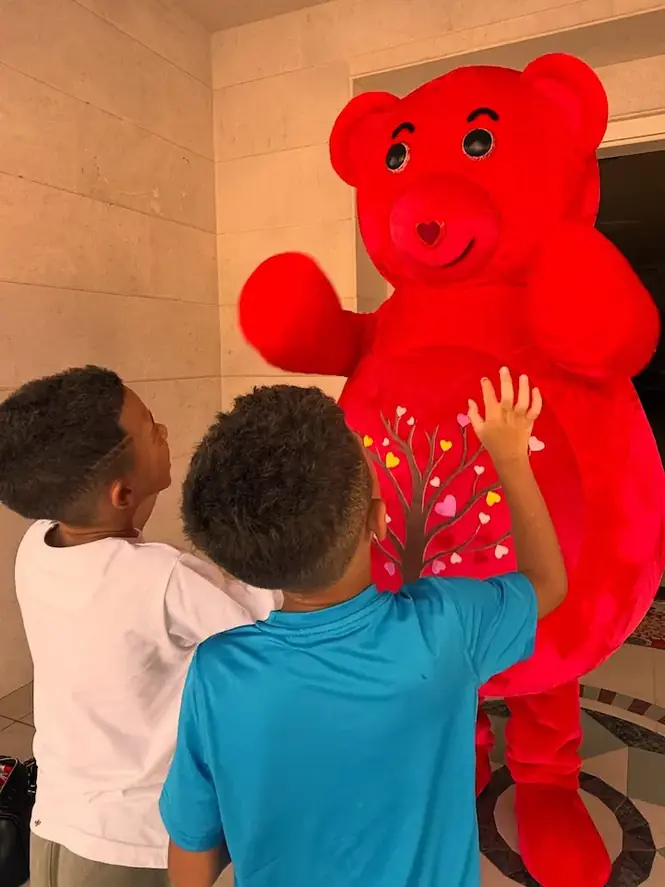 Children doing yoga with YogaBears characters 1